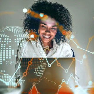 Smiling lady looking at a laptop screen